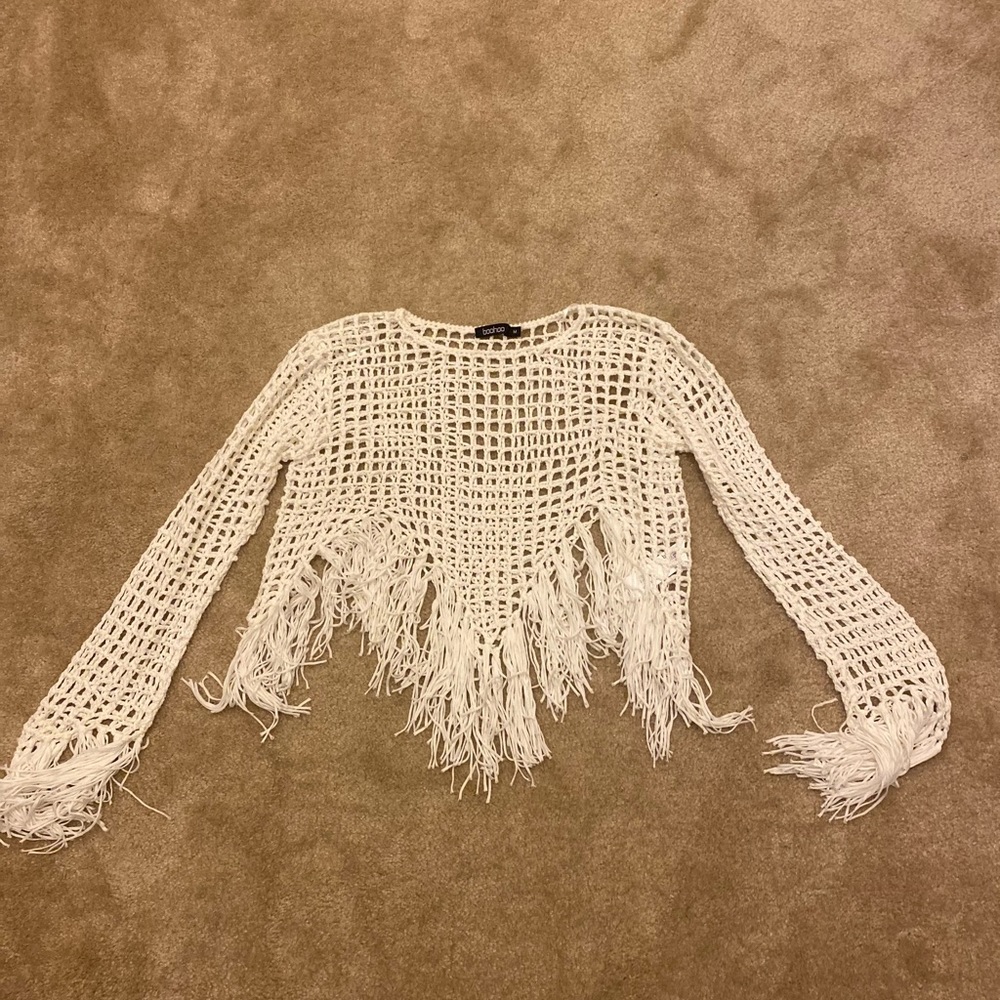 White fringed beach cover up